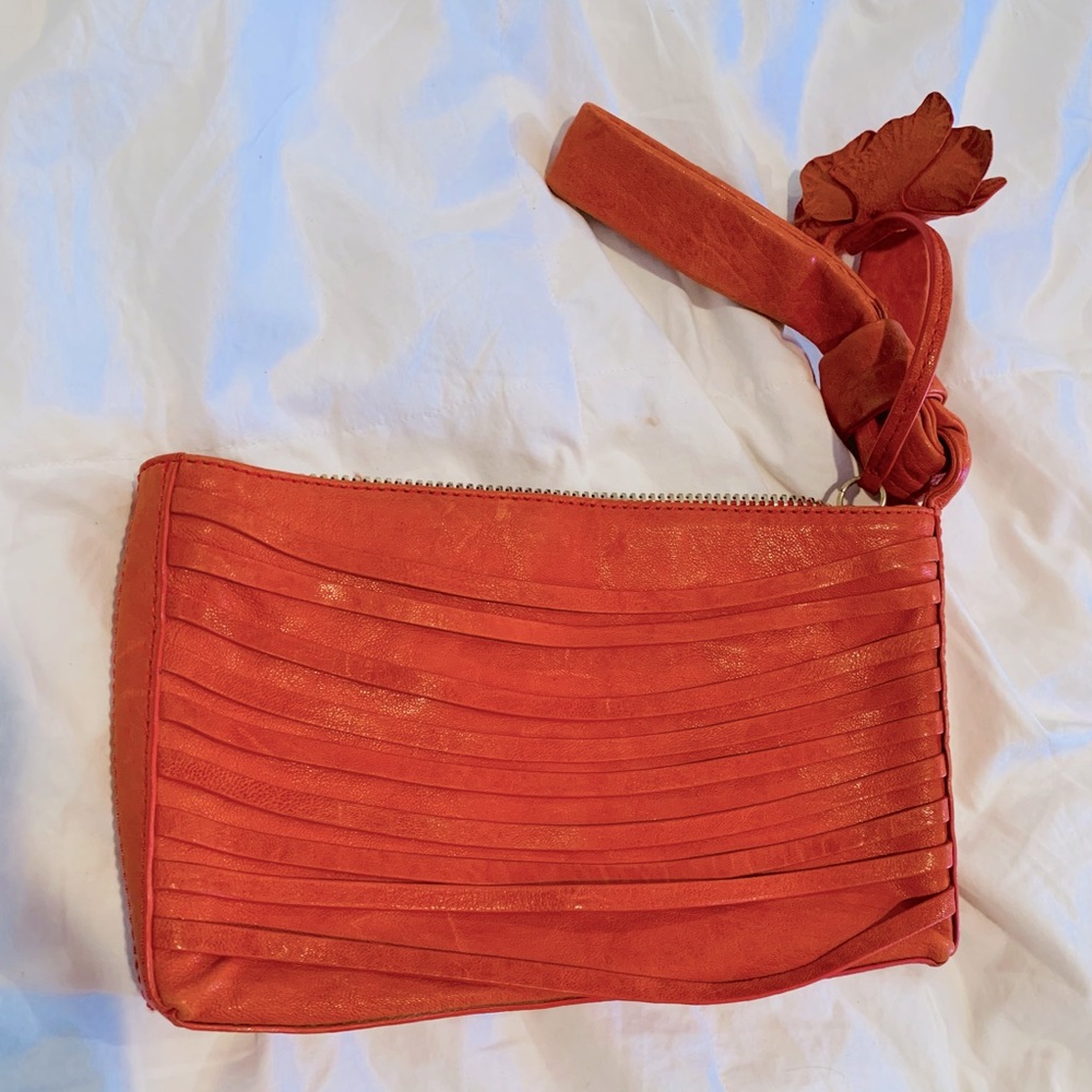 Nanette Lepore Coral Leather Clutch with fringe design